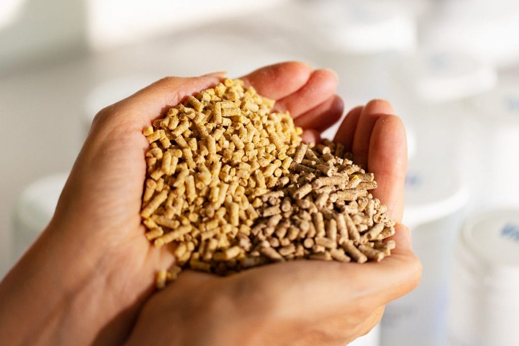 Animal nutrition products in various packaging.