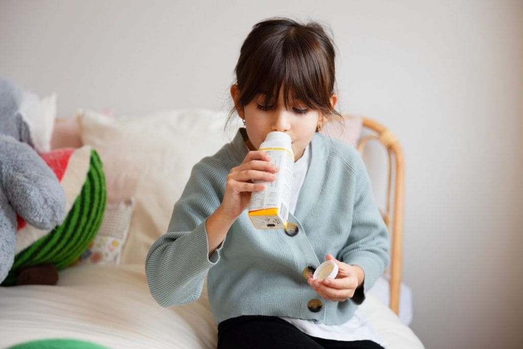 7 Girl drinking Yogurt or PB Yogurt