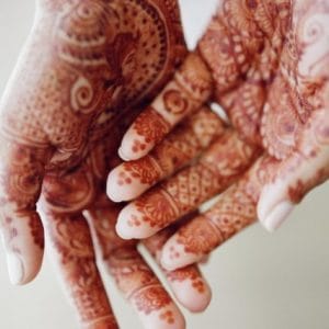 A hand with a henna tattoo