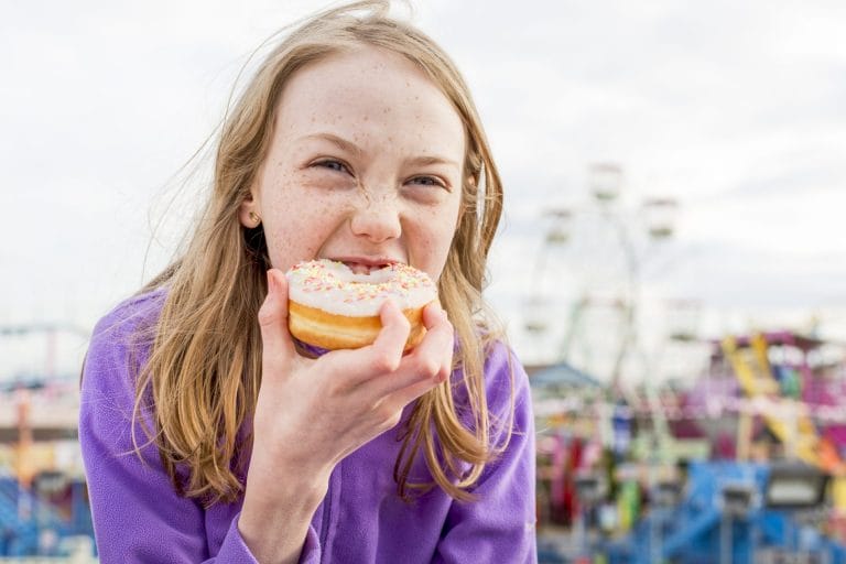 A child eating a donut