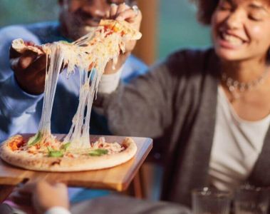 Family sharing pizza