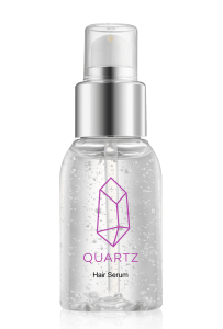 A clear bottle with a silver pump dispenser containing a transparent liquid with small bubbles. The bottle has a purple geometric crystal logo and the text 