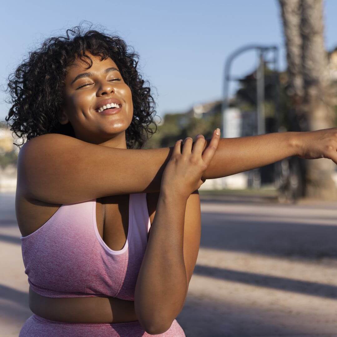front-view-smiley-woman-stretching-arm