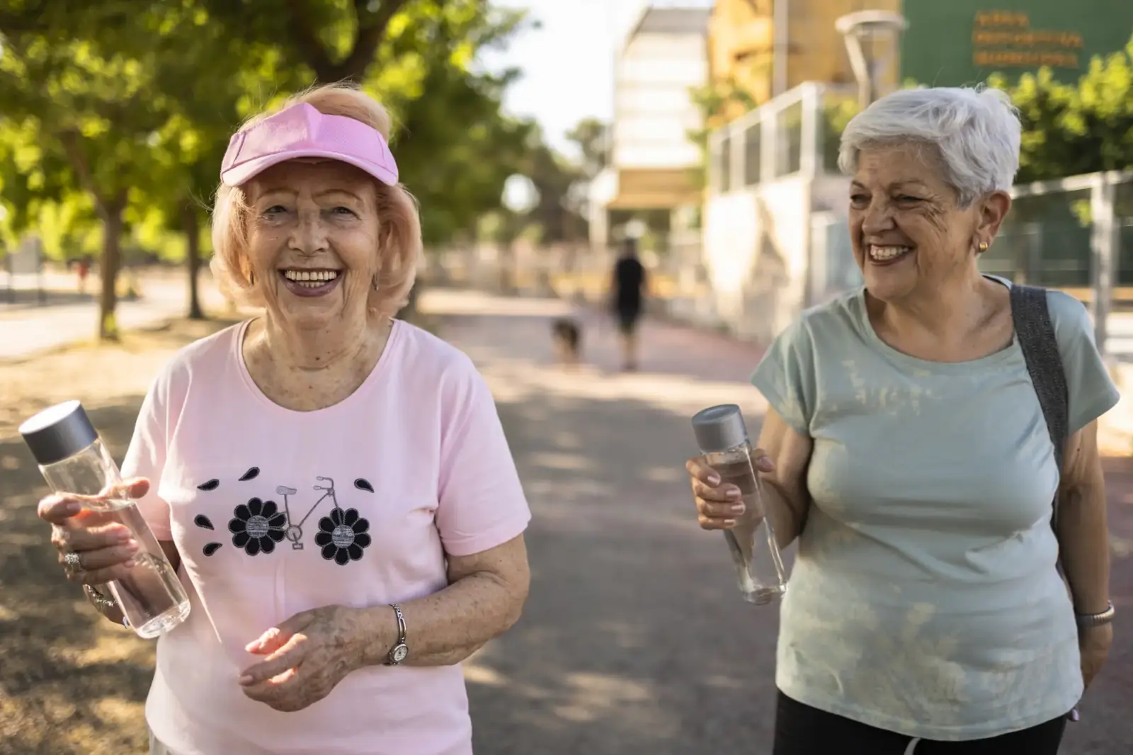 cheerful-seniors-walking-and-staying-hydrated-in-p-2026-09-22-11-47-51-utc
